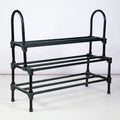 Black metal shoe rack from Ledgeandlilac, three-quarter view of this sturdy, modern shoes storage organizer.