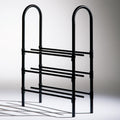 Black metal shoe rack from ledgeandlilac, three-quarter view showing multiple tiers for organized shoe storage.