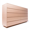 Contemporary gray double dresser by LedgeandLilac, three-quarter view showing sleek design and modern wooden drawer handles.