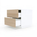 White LedgeandLilac kitchen base cabinet with two doors, shown in a three-quarter view, suitable for storage in modern kitchens.
