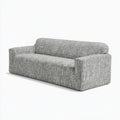Ledgeandlilac light gray three-seater sofa with protective slip cover, modern and comfortable living room furniture.