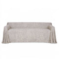 Light gray three-seater sofa from LedgeandLilac with protective slipcover, showcasing a modern, comfortable living room furniture piece.
